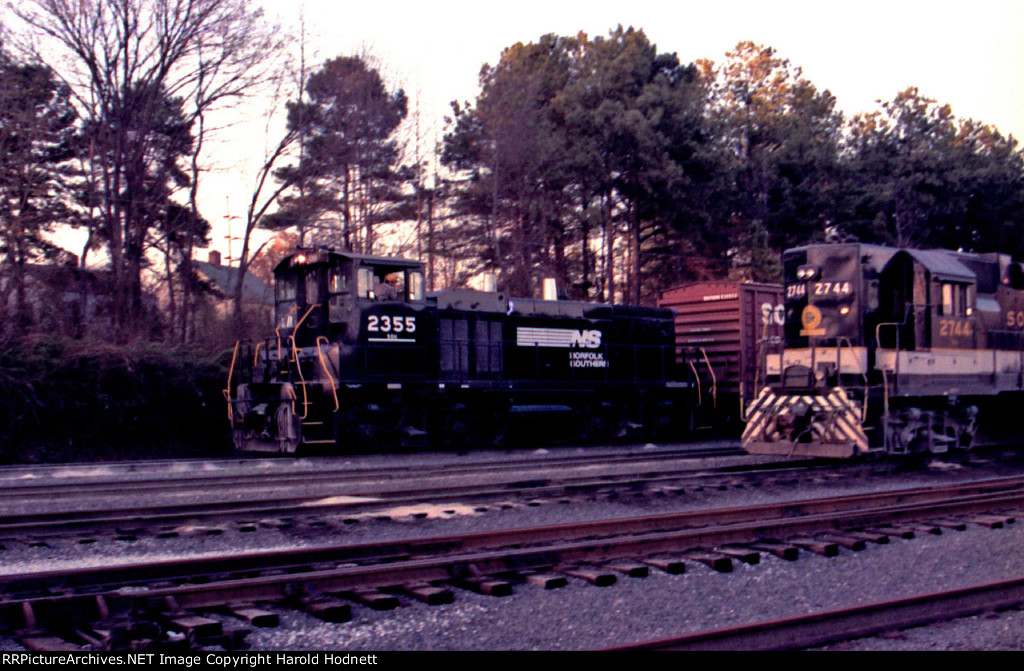 NS 2355 works Glenwood yard as the sun is rapidly disappearing